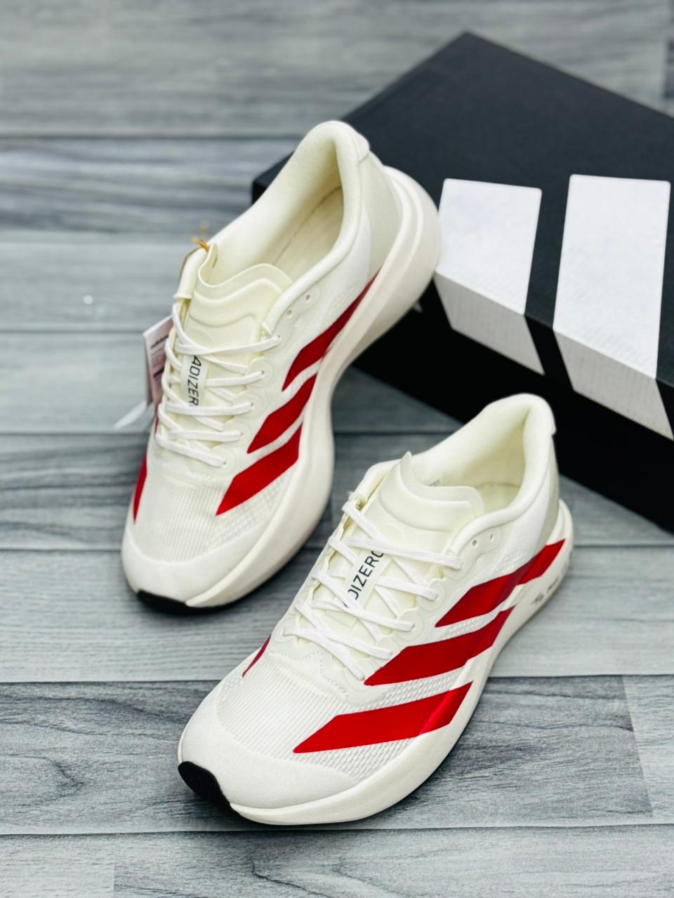 ADIDAS ADIZERO EVO SL | CREAM/RED